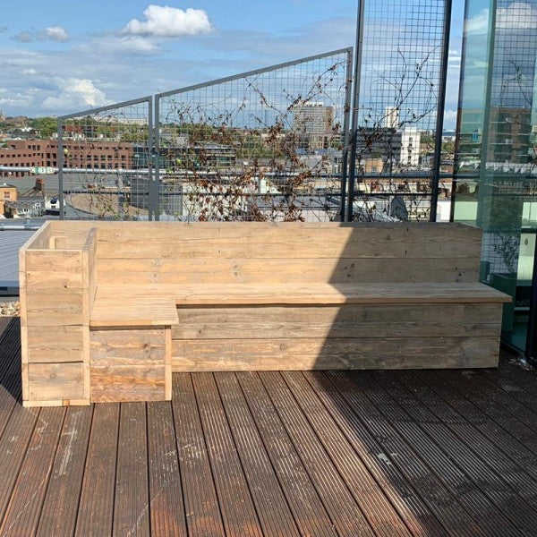Corner seating bench with planter