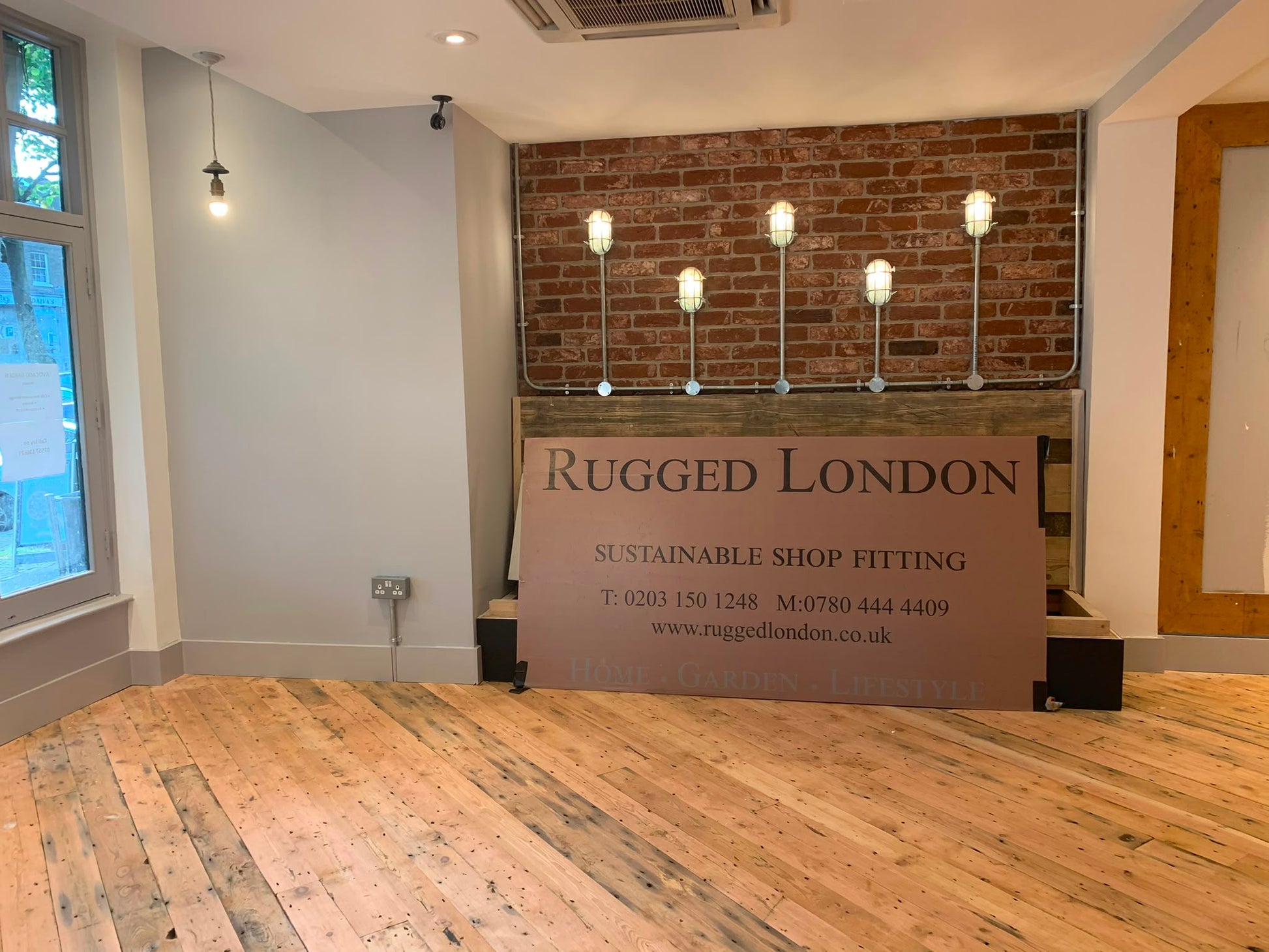 Reclaimed Victorian floorboards laid in a shop fit-out by Rugged London